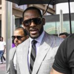 R. Kelly leaves Leighton Criminal Courthouse with supporters in June 2019.Ashlee Rezin/Sun-Times file photo